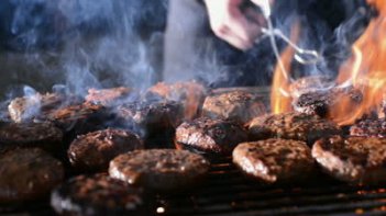 rsz_stock-footage-hamburgers-kooking-on-a-barbeque-grill-with-flames-and-smoke.jpg